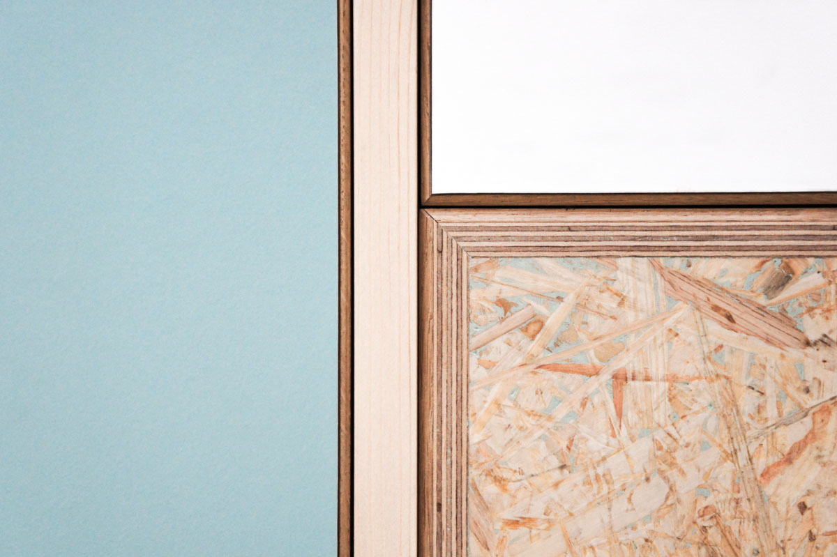 Credenza in mint green and vanilla laminate, pine wood, and OSB with recycled black door knobs by Atelier Antipode