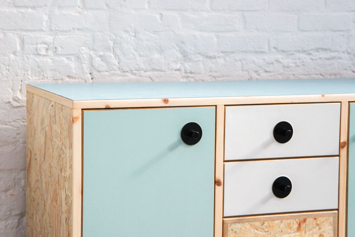 Credenza in mint green and vanilla laminate, pine wood, and OSB with recycled black door knobs by Atelier Antipode