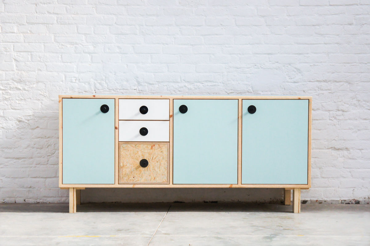 Credenza in mint green and vanilla laminate, pine wood, and OSB with recycled black door knobs by Atelier Antipode