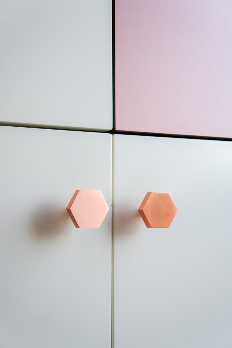 Atelier Antipode | pastel patchwork | wardrobe of white laquered doors matched with pastel laminate and oak, handmade meranti handles and copper cabinet knobs by Schoolhouse Electric